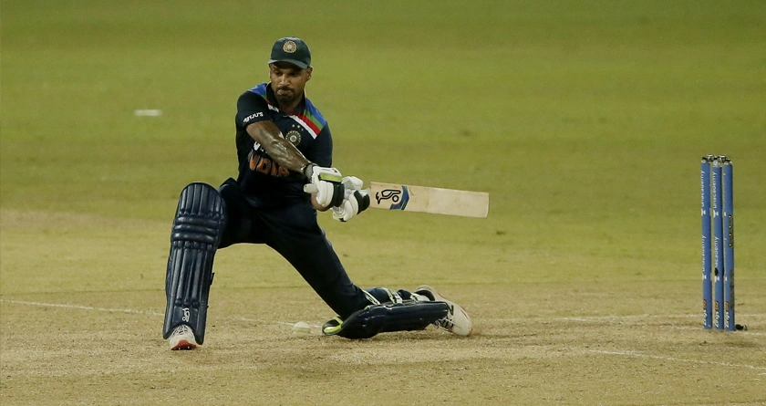Dhawan moves up two places